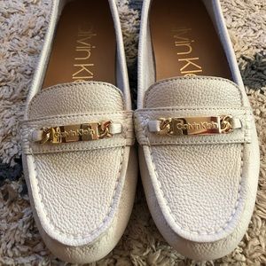Calvin Klein white slip-on loafers
